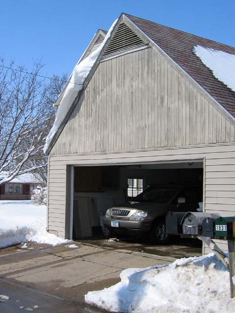 Snowy overhang on the garage