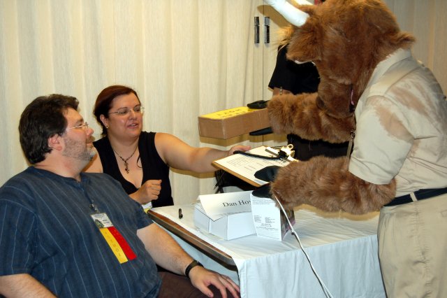 Exchanging parcel and clipboard.