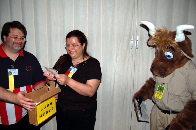 Orvan watching the Hoyts open Sarah's parcel.