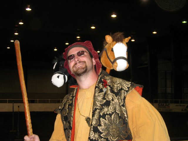 Man and a couple toy horses
